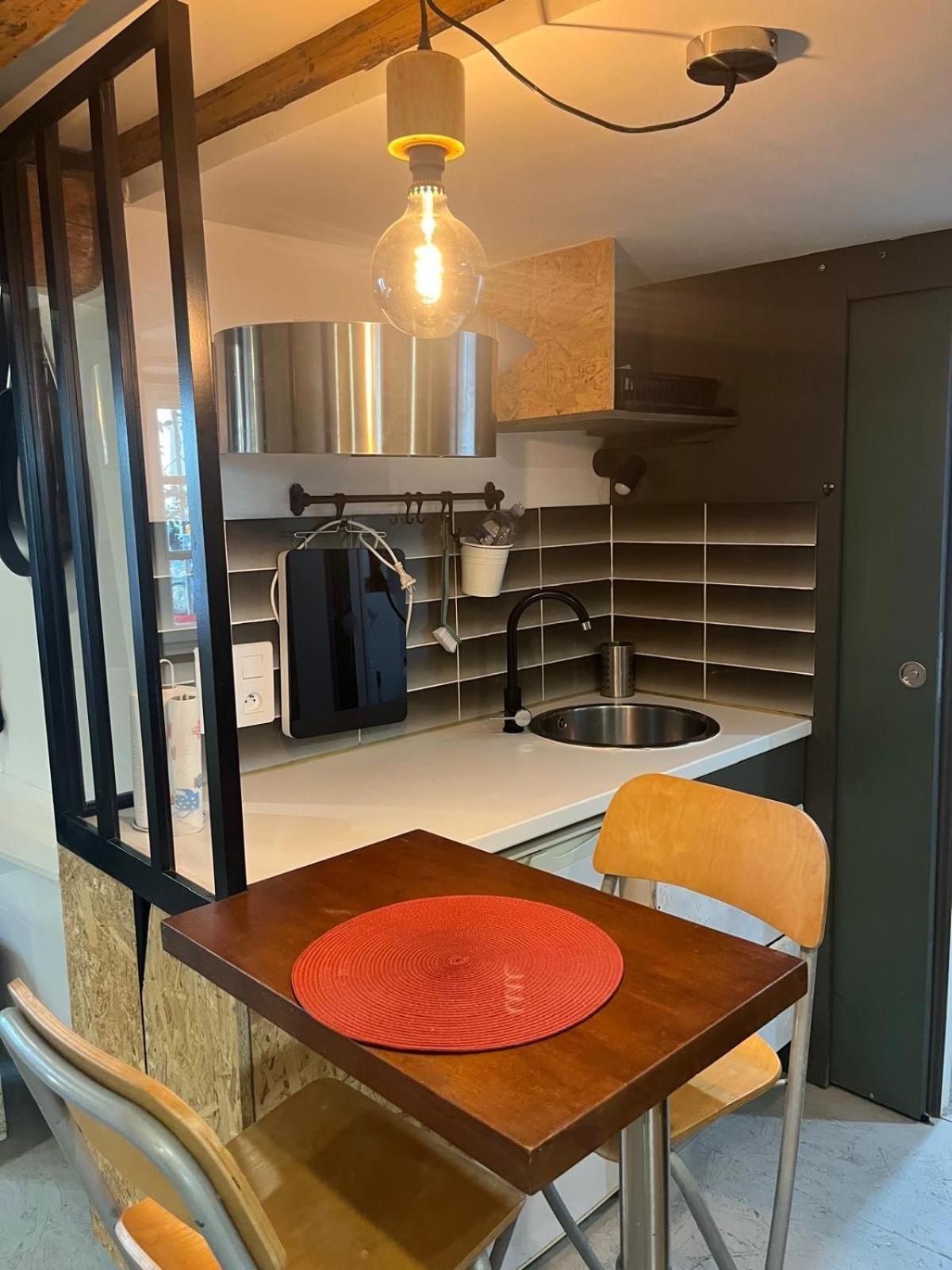 Appartement Charming Studio, Ecusson